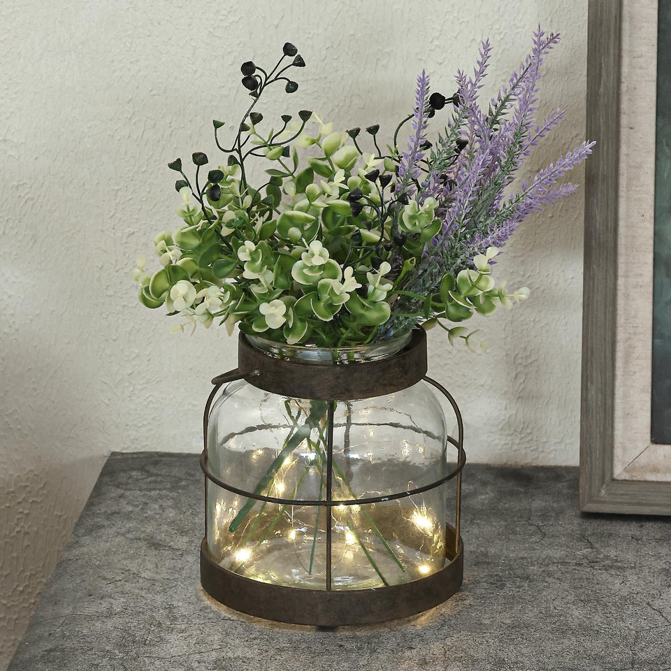 FIAHOSEY vintage glass farmhouse vase with lantern adds warm ambiance to your space.