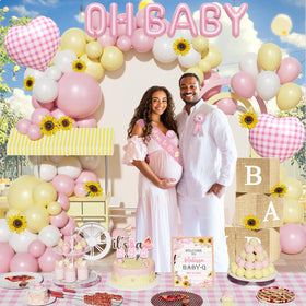 Fiesec Baby Q cake topper and poster highlight party branding.
