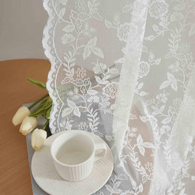 FineCITY ivory lace panel closeup shows scalloped edges and embroidery for elegant privacy.