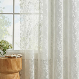FineCITY ivory lace curtains highlight the dual-rod pocket design for simple hanging.