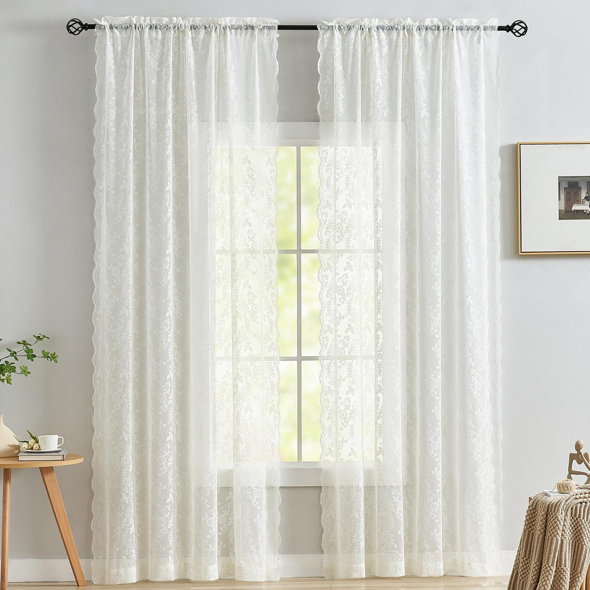 FineCITY ivory lace curtains in a living room filter light with privacy.