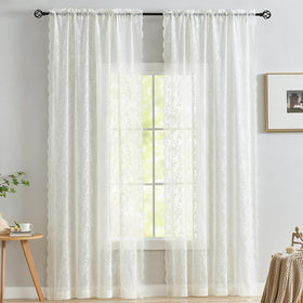 FineCITY ivory lace curtains in a living room filter light with privacy.