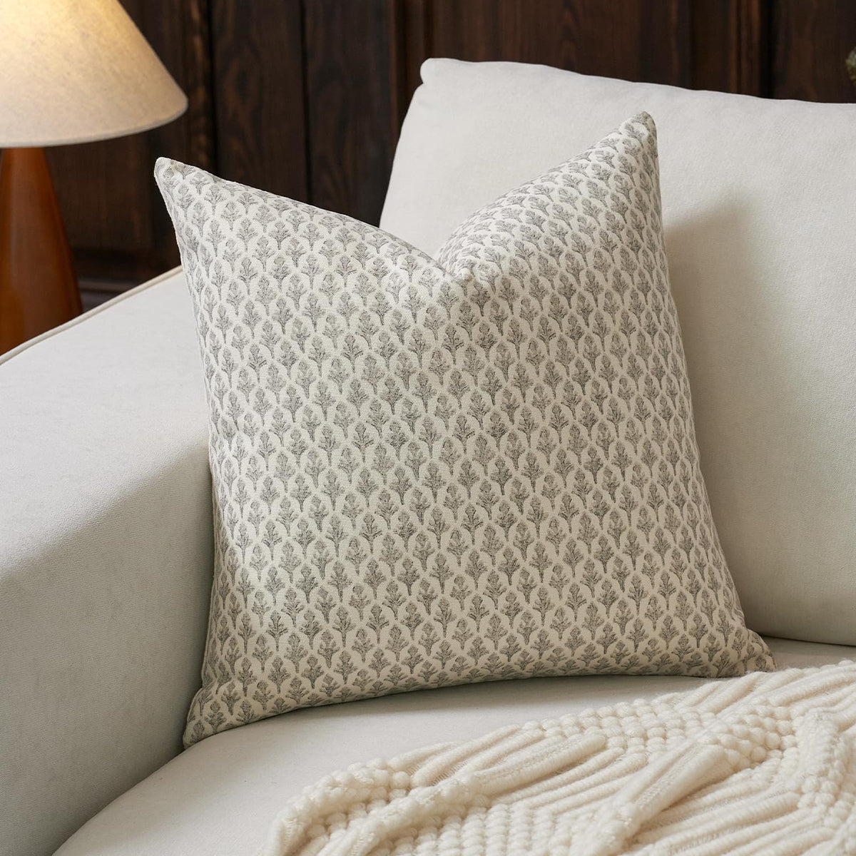 FIOUOVO floral pillow cover 24x24 in light taupe adds timeless elegance to sofas.