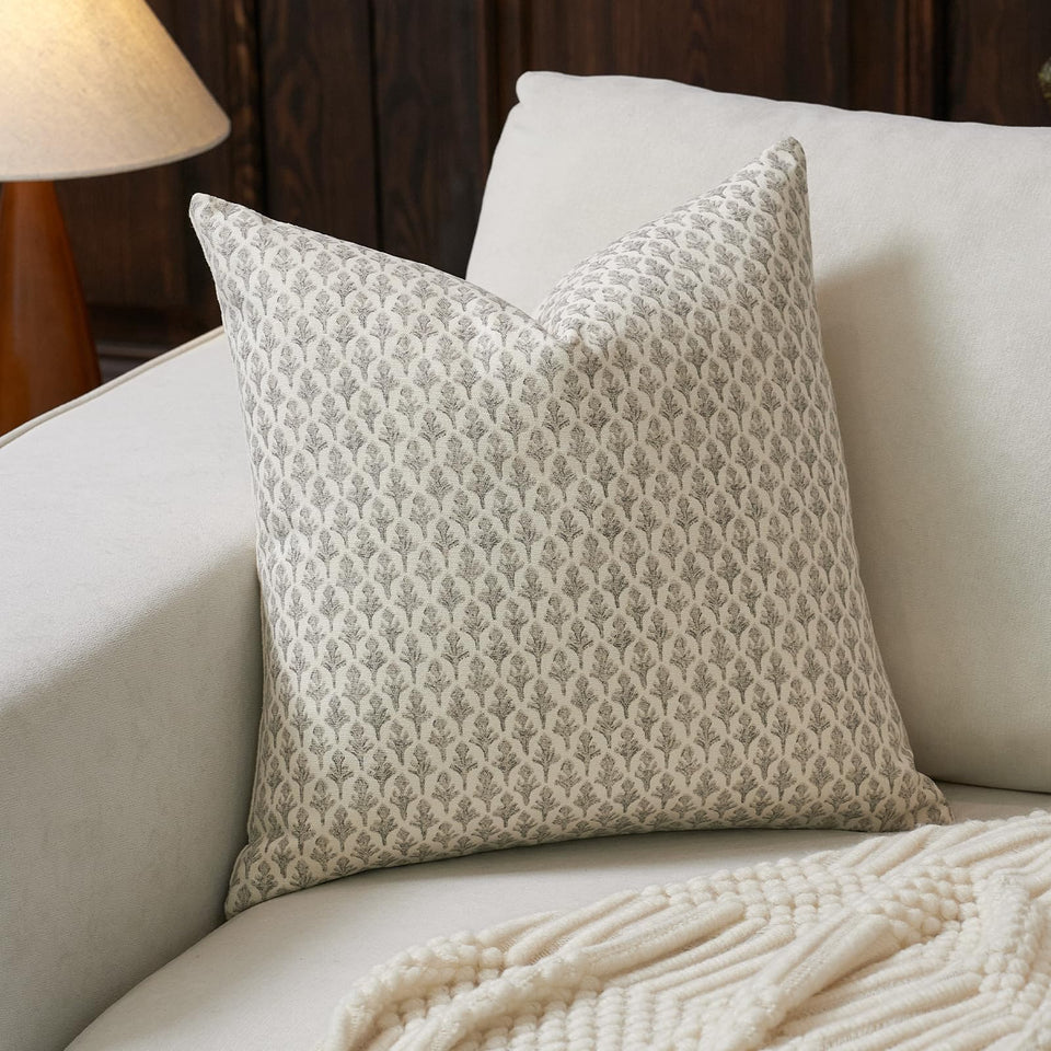 FIOUOVO floral pillow cover 24x24 in light taupe adds timeless elegance to sofas.