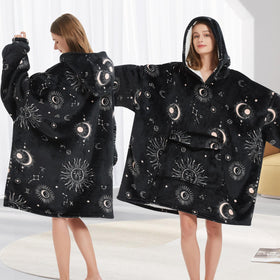 Fiosnow Sun and Moon Hoodie in a lounging setup on a sofa