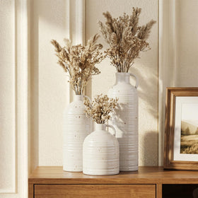 Firehold vase trio filled with dried pampas grass creates natural focal point.