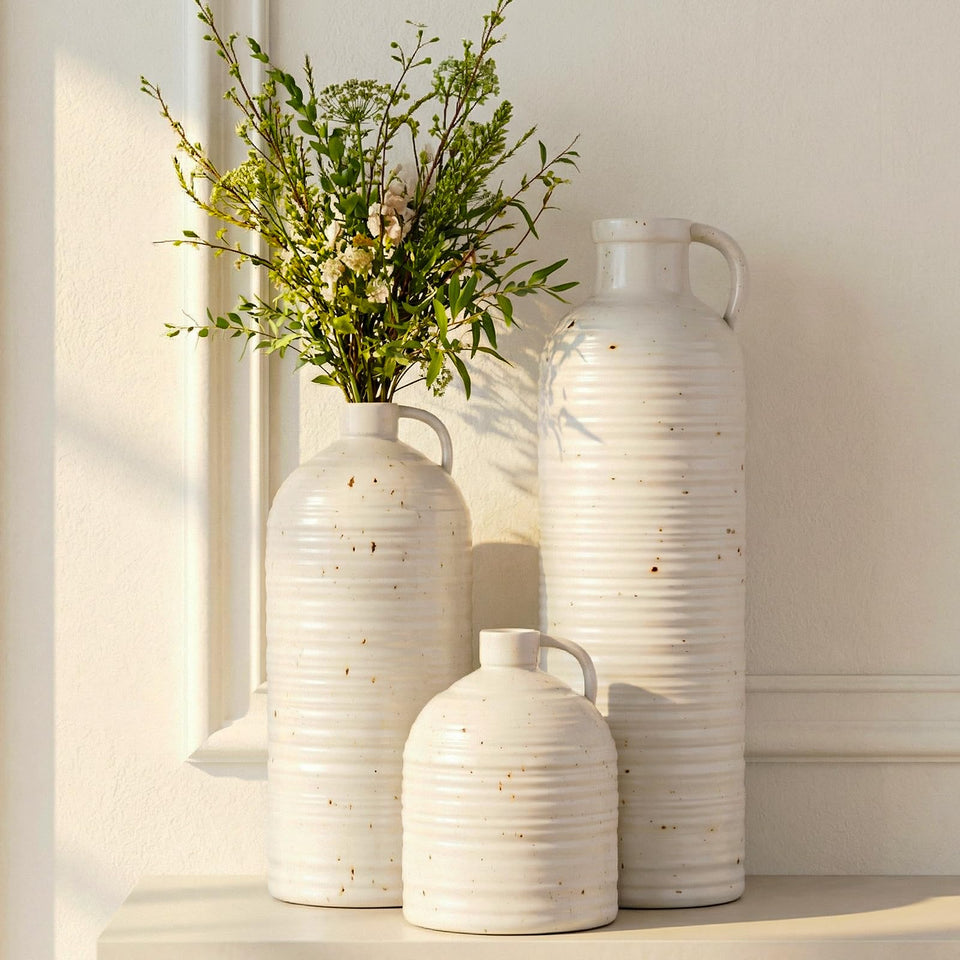 Firehold vase trio with ribbed cream texture, ideal for shelf decor and fresh or dried blooms.