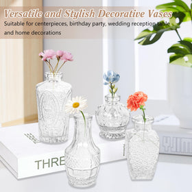 Fivenl wedding centerpieces feature clear glass that enhances light and color.