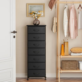 Fixwal black tall skinny dresser in a cozy bedroom for versatile storage.