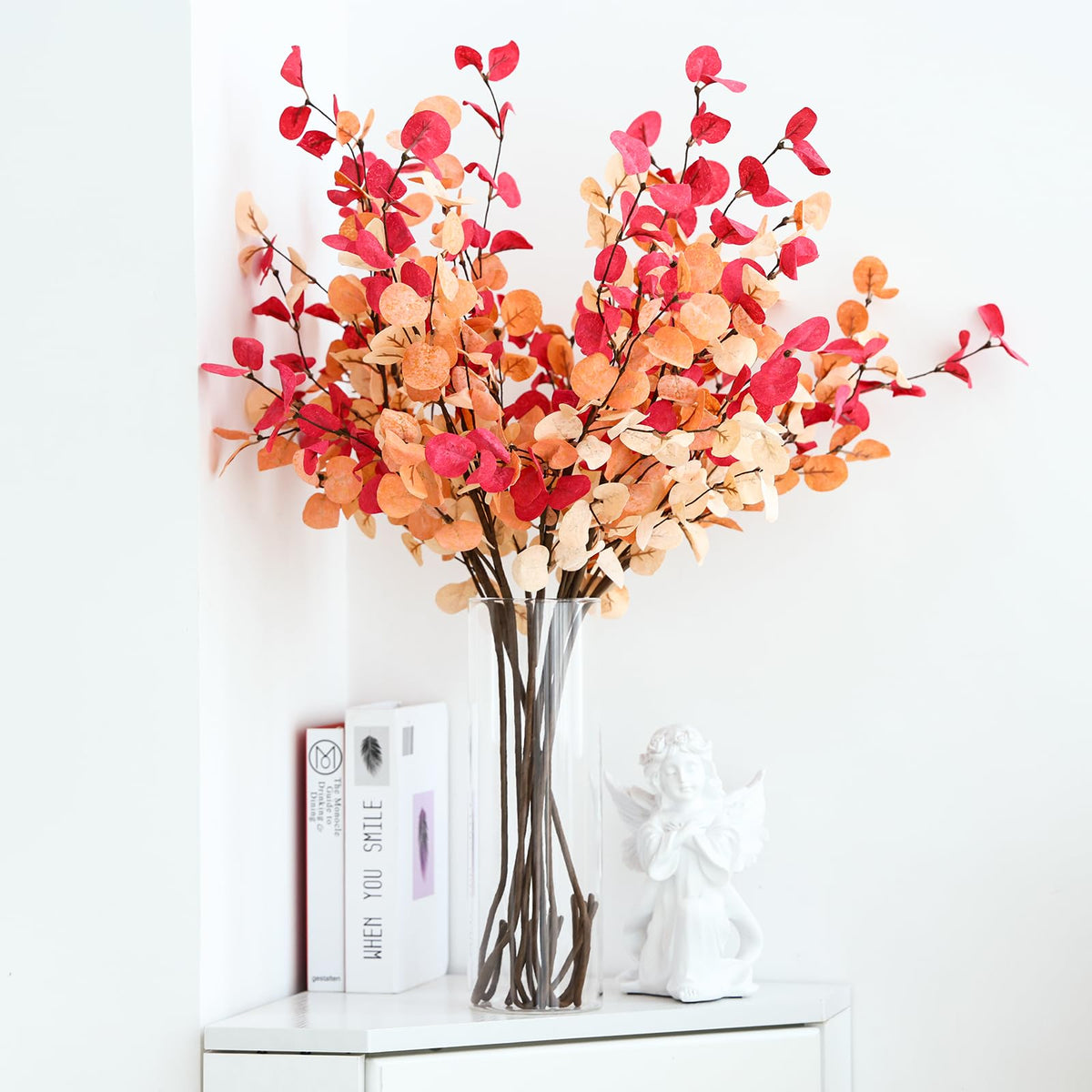 Fixwal floating candle vase display adds ambient table lighting.