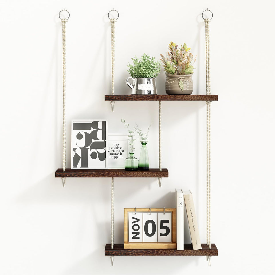 Fixwal three-tier hanging shelf displaying plants in a cozy living space.