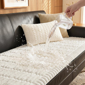 Fixwal pet-friendly couch cover with waterproof backing protecting sofa from spills.