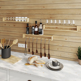 Fixwal wall-mounted shelves save floor space in nursery and play areas.