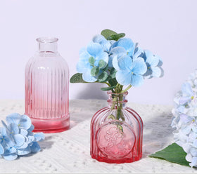 Fixwal vintage pink bud vases detail showing varied designs for versatile home decor.