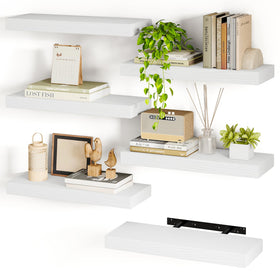 Fixwal white floating shelves in bathroom wall decor offering extra storage.