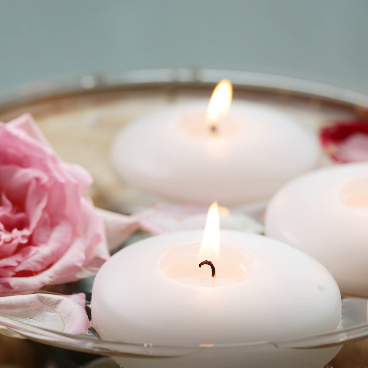FlameCan dripless paraffin wax floating candle with cotton wick