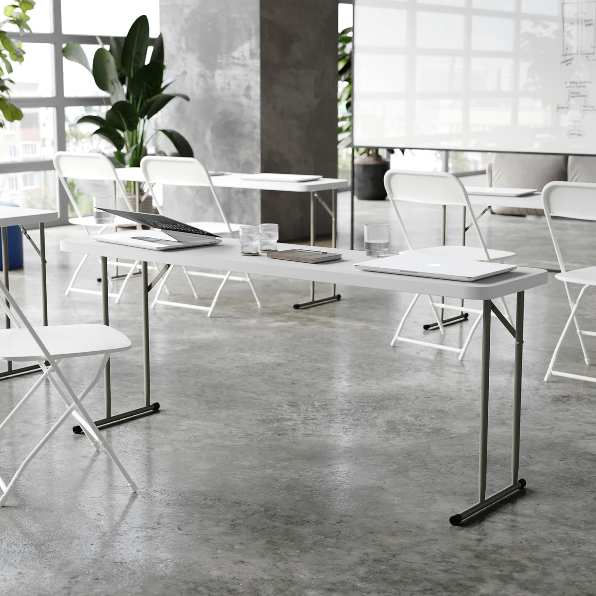 Flash Furniture Kathryn 6ft table seats up to three adults on one side for discussion.