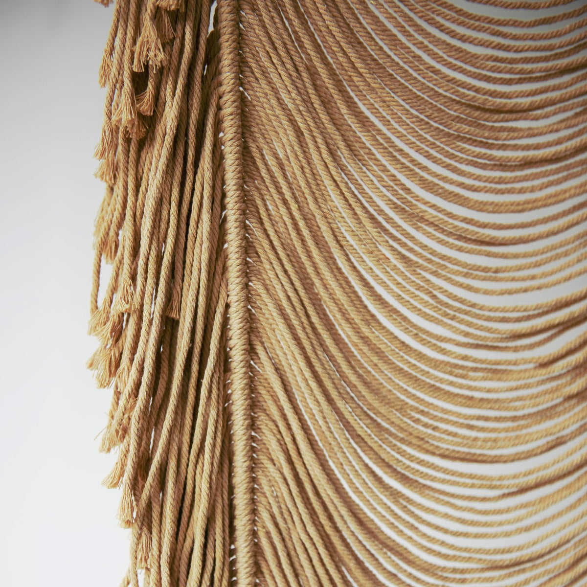 Flber macrame curtain easy-care routine maintains natural look