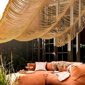 Flber macrame curtain soft light filtering creates cozy living room ambience