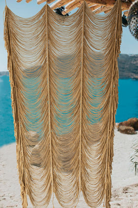 Flber macrame curtain close-up shows 100 percent cotton weave and craftsmanship