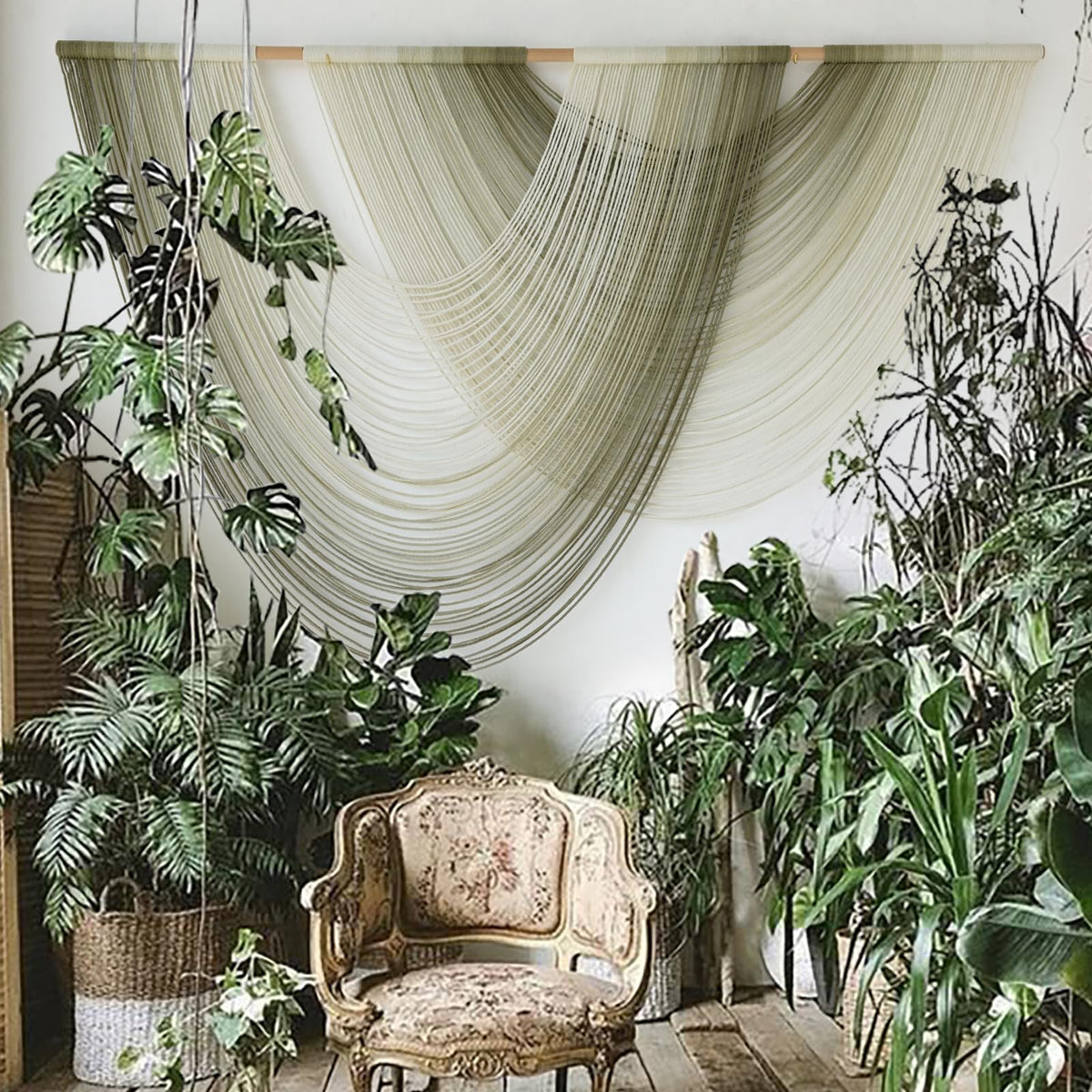 Flber macrame wall hanging with moss green ombre, ideal as a calming living room focal point.