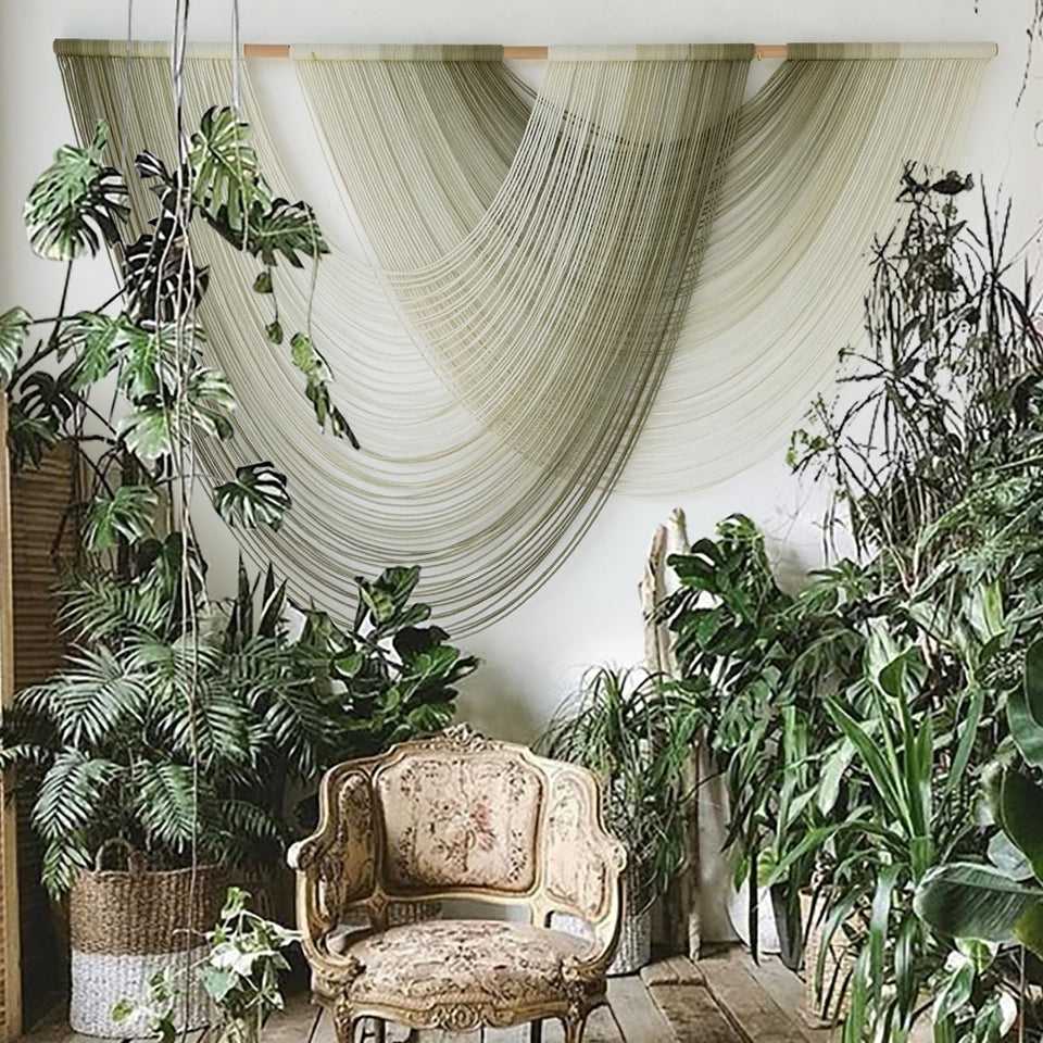 Flber macrame wall hanging with moss green ombre, ideal as a calming living room focal point.
