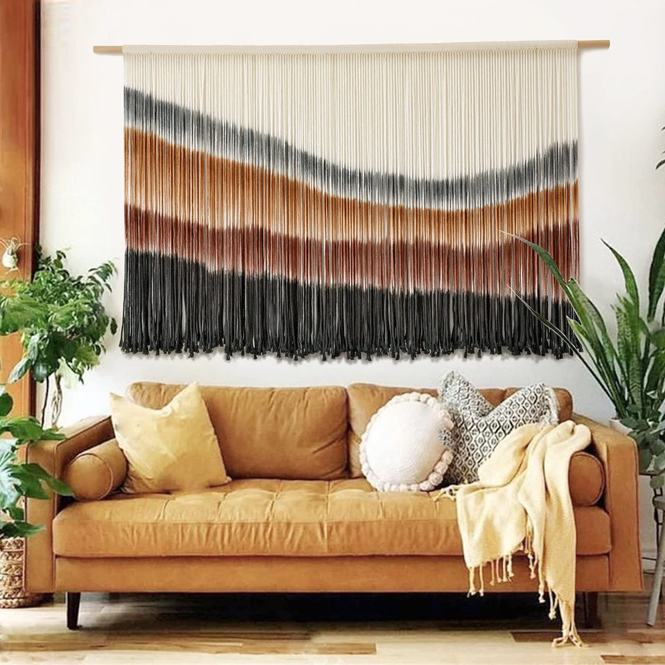 Flber macrame wall hanging in coffee brown tie-dye enhances cozy living spaces.