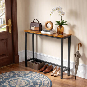 Flevra entryway table with black metal frame adds modern industrial style.