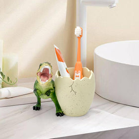 FlidRunest dinosaur toothbrush holder in green adds playful charm to the sink.