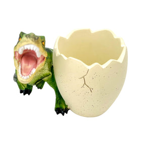 FlidRunest dinosaur toothpaste holder doubles as compact bath storage.