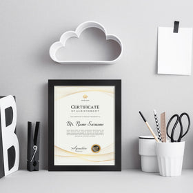 Flocey frame with clear plexiglass front protecting photos and documents.
