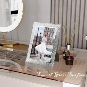 Back tabs simplify swapping photos in Flocey frames.