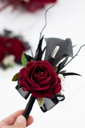 Floinla wristlet corsage showing elastic pearl-embellished bracelet