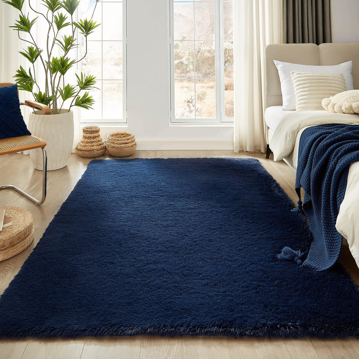 Floralux dark blue solid shag pile adds warmth and depth to living rooms