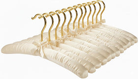 Florida Brands padded hangers with satin bow in ivory for delicate garments.