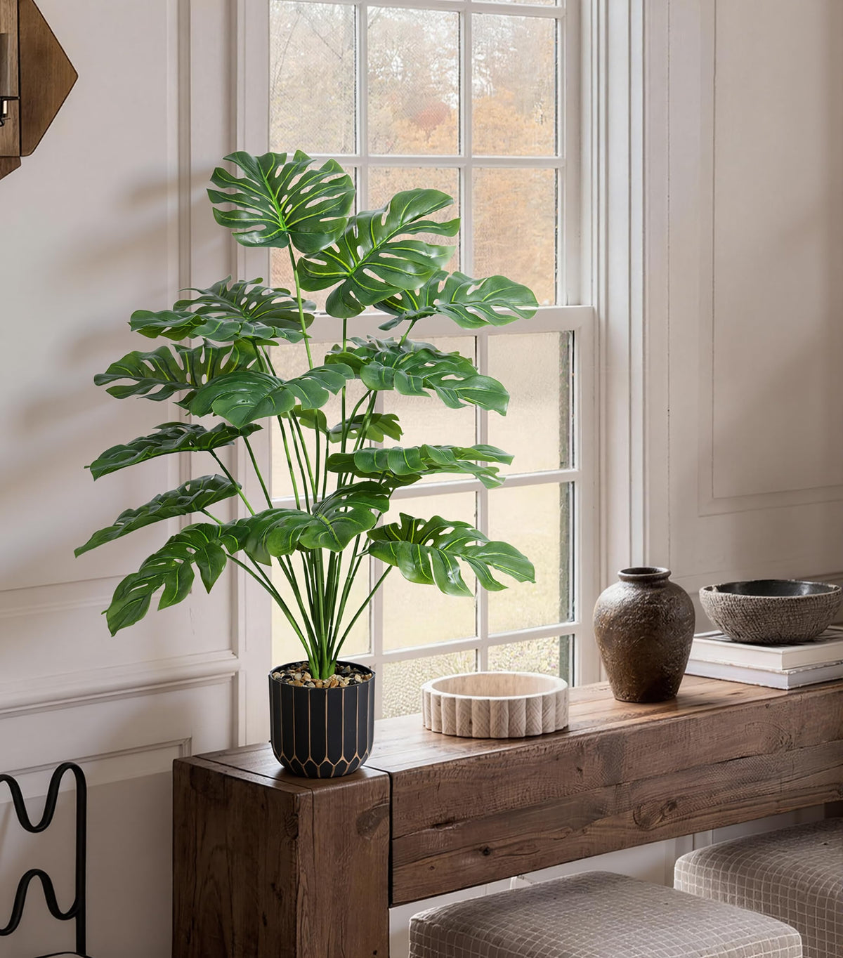 Florisso living-room monstera decor adds lush tropical charm year-round.