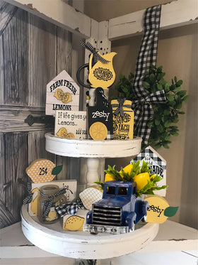 FLOROAD navy truck with lemon greens decorates shelves and tables.