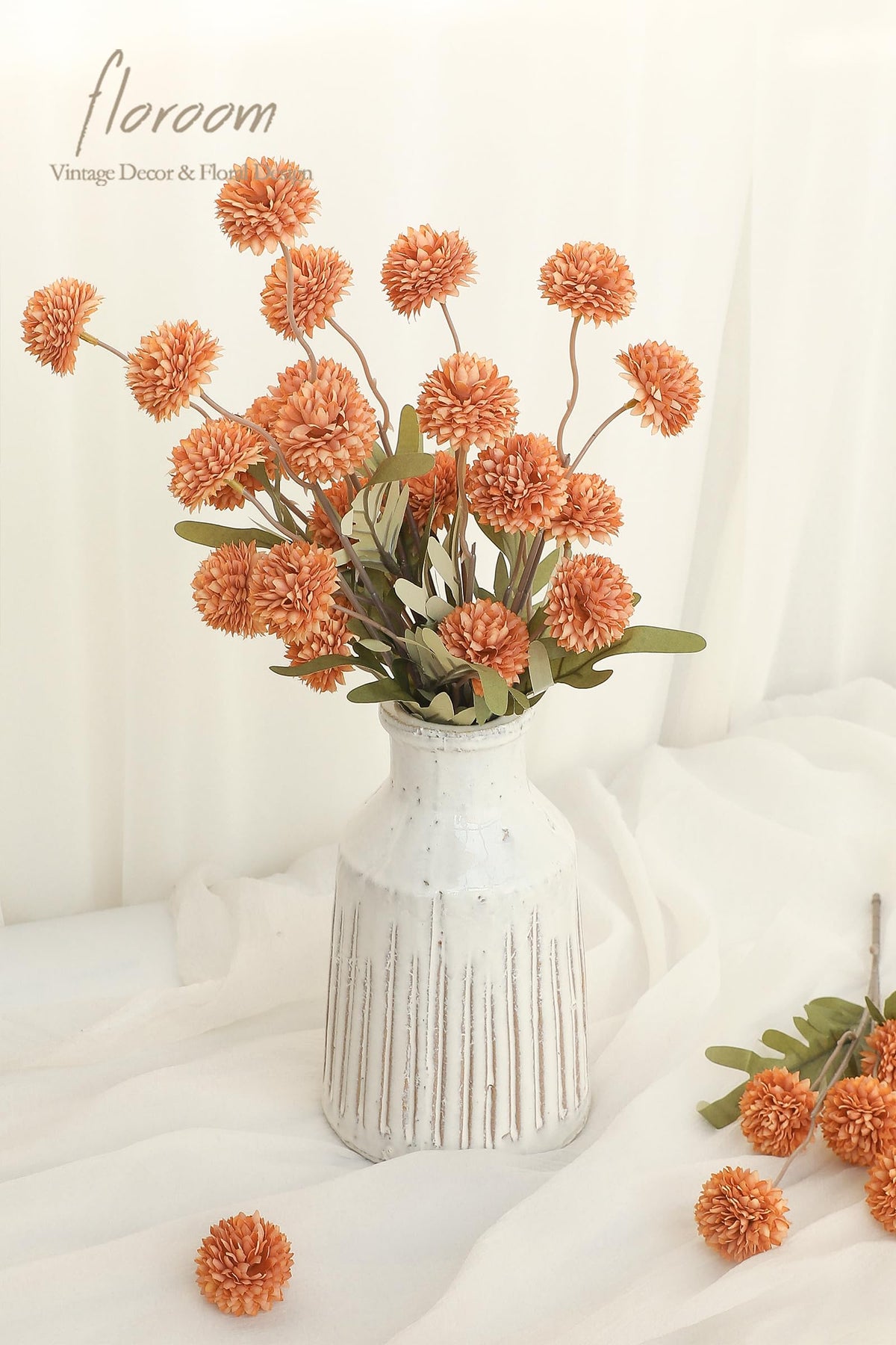 Floroom DIY wedding centerpiece idea using burnt orange mums for elegant bouquets
