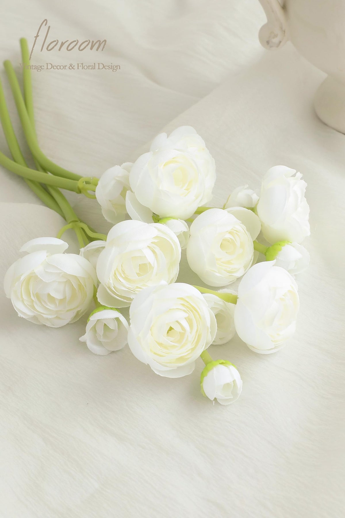 Floroom silk ranunculus stem with iron wire for flexible crafting.
