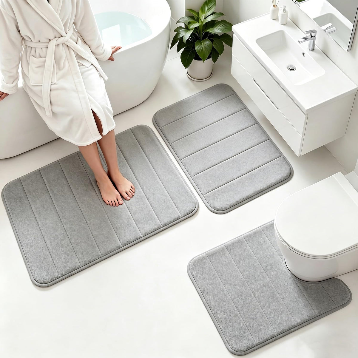 Flotstiga memory foam bath mat small 16x24 with plush surface for soft steps.