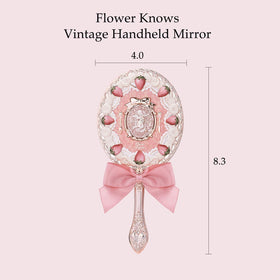 Flower Knows Strawberry Cupid Hand Mirror handle close-up showing ergonomic grip for easy use.