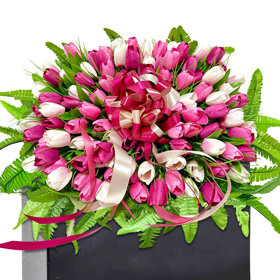 FLOWERIA Spring Flowers grave saddle with artificial tulips provides lasting color on headstones.