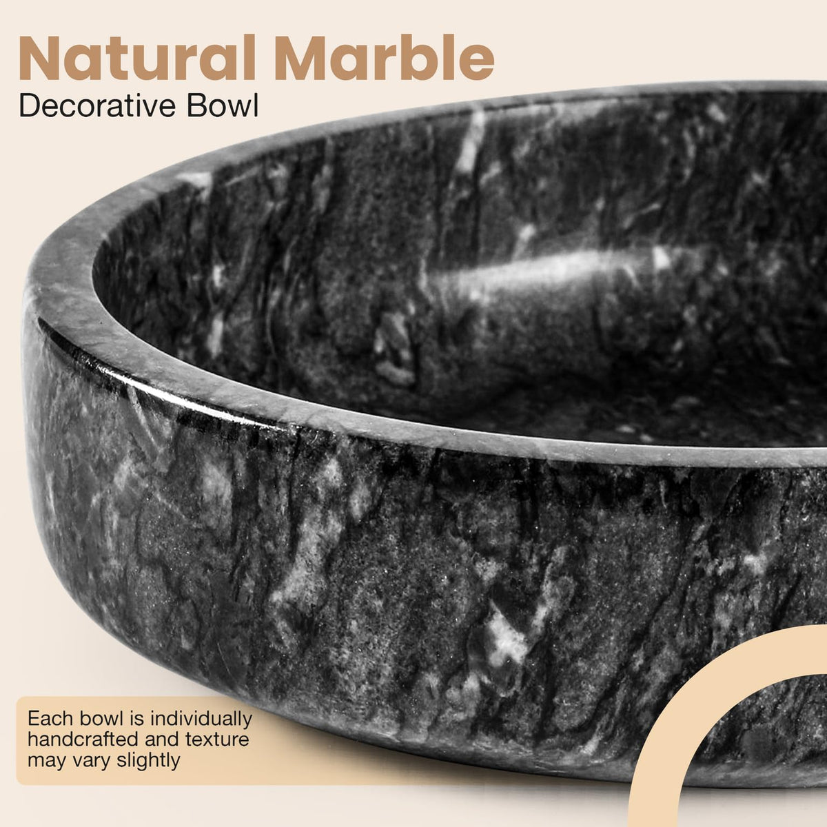 Marble bowl holding keys on a minimalist entryway console
