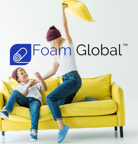 Foam Global Queen size topper on bed provides generous support across full width.