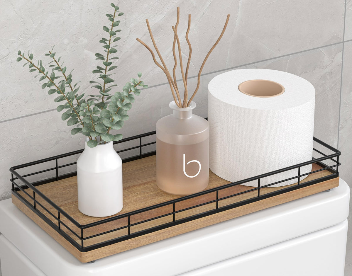 Focusonit toilet basket with acacia wood base on tank keeps essentials organized.