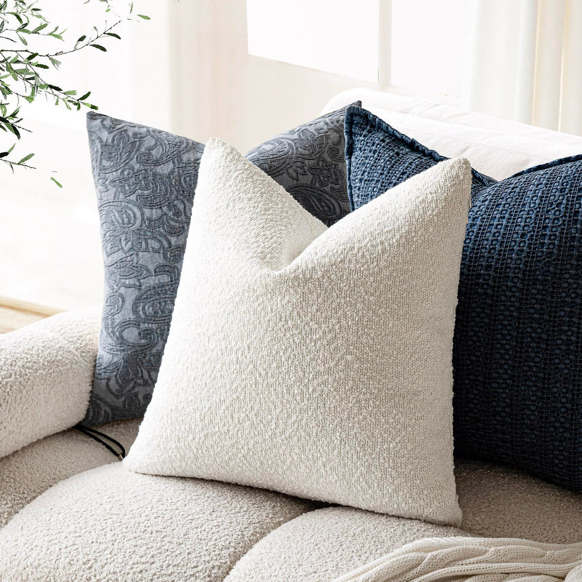 Foindtower bedroom-friendly pillow cover enhances cozy seating.