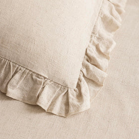 Foindtower boho-farmhouse pillow cover enhances couch styling with a soft beige palette