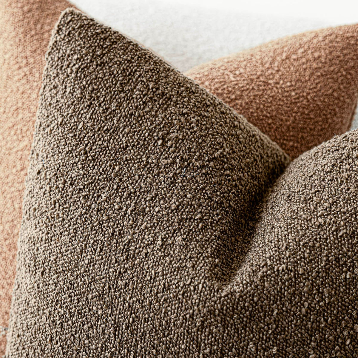 Foindtower decorative pillow cover in a bedroom elevates neutral décor.