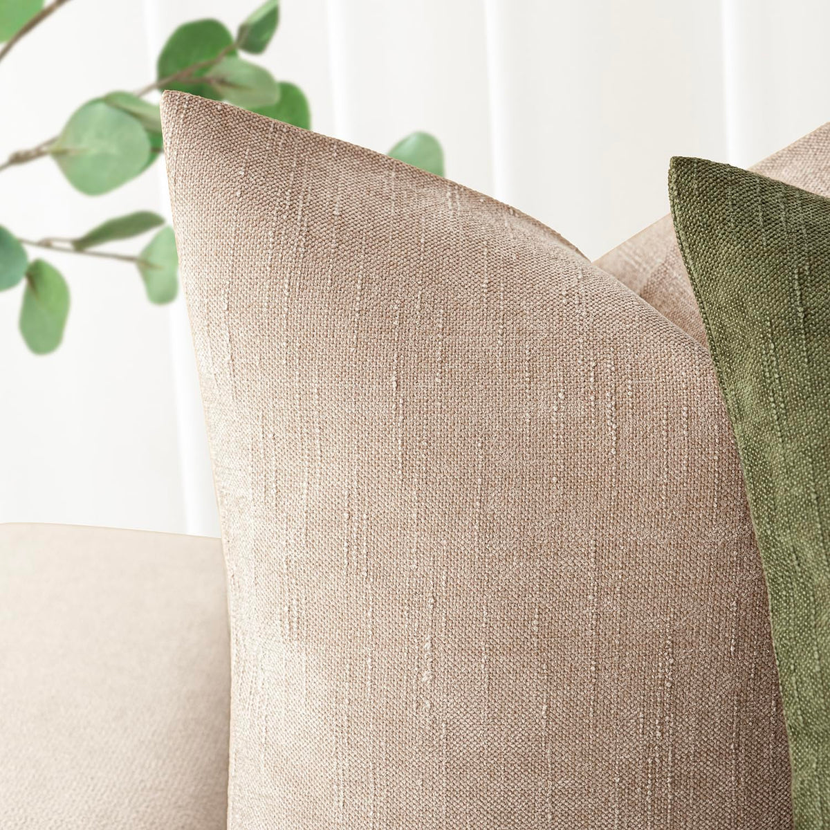 Foindtower decorative pillow cover adds refined texture to living room seating.