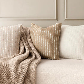 Pair of Foindtower decorative pillows boosts bedroom and living room aesthetics.